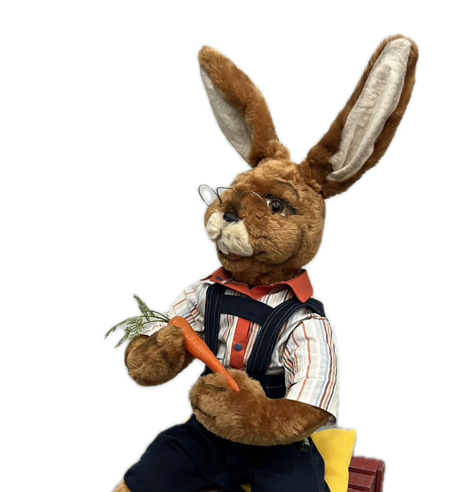 Hase sitzend mit Möhre