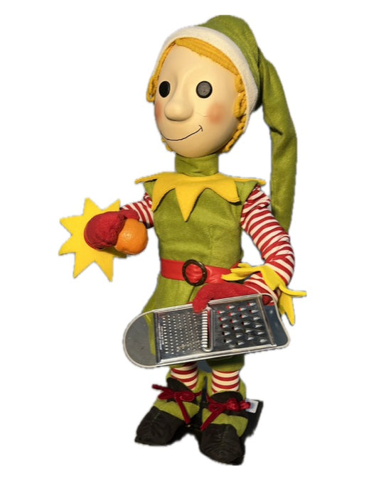 Elf mit Knopfaugen und mit Reibe (Weihnachtsbäckerei)