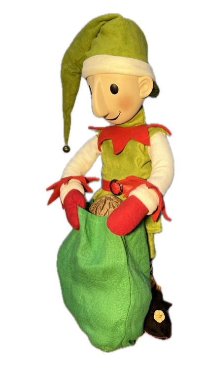 Elf mit Knopfaugen und mit großem Jutesack (Weihnachtsbäckerei)