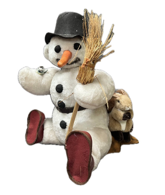 Paul der Schneemann sitzend